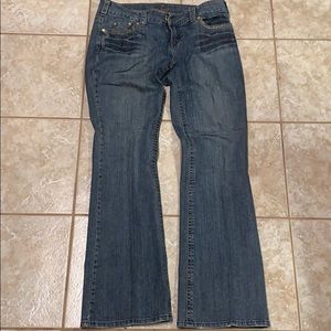 Women’s Guess Jeans, orange accents, size 32